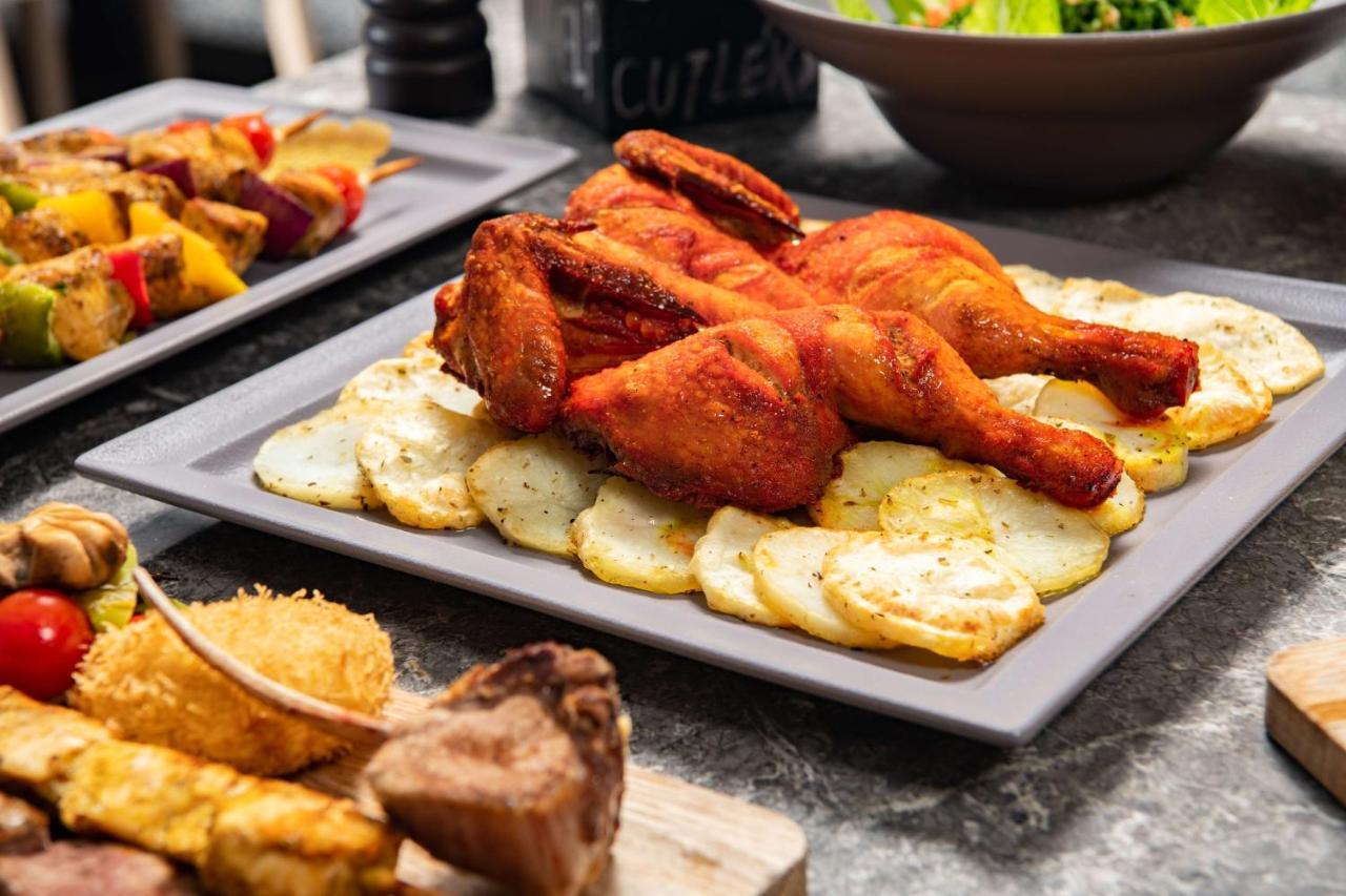 Park Inn By Radisson Makkah Aziziyah 메카 외부 사진 A plate of chicken pakora